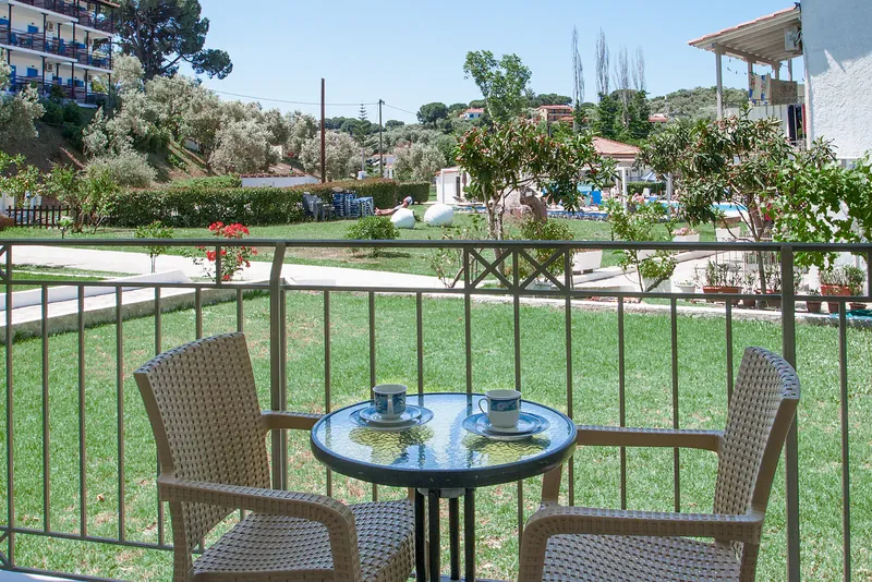 Coffee for two on a balcony over the garden