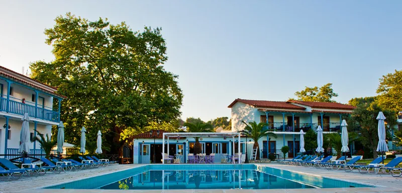 The pool in front of the hotel buildings