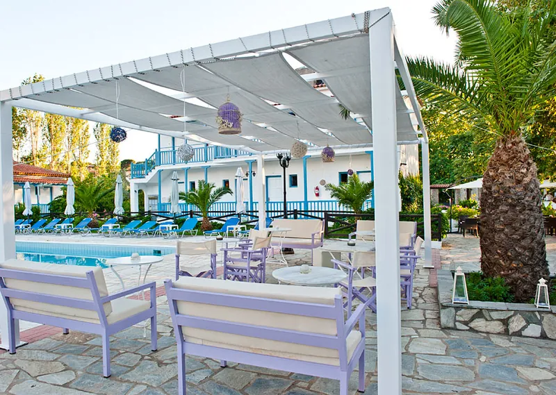 Sofas at the pool bar, beside the pool